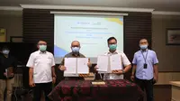 Penandatanganan perjanjian kerja sama antara Pelindo 3 Group, Pertamina Group dan PT Wilmar Nabati Group.