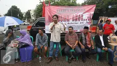  Massa yang tergabung dalam Gerakan Rebut Jakarta Selamatkan Indonesia (Gerak Indonesia) melakukan aksi unjuk rasa menolak Gubernur DKI Jakarta Basuki T Purnama pada Pilkada 2017 di Tugu Proklamasi, Jakarta, Senin (29/8). (Liputan6.com/Immanuel Antonius)