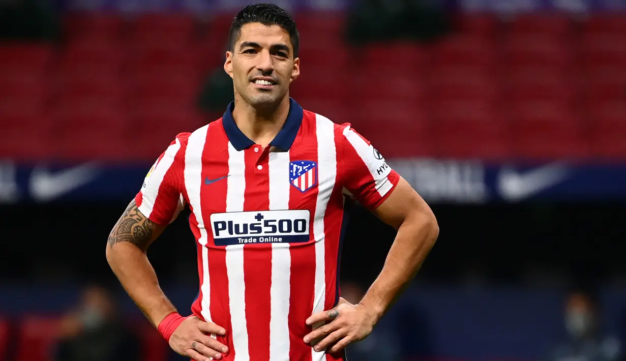 2. Luis Suarez (5 gol) - Luis Suarez membuktikan dirinya masih tajam dan berbahaya dalam urusan mencetak gol. Pemain yang dibuang Barcelona ini membuktikan kemampuannya dengan torehan 5 gol dari 6 laganya bersama Atletico Madrid. (AFP/Gabriel Bouys)