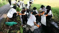 BRI Peduli Sambut HUT ke-129 dengan Kampanye Edukasi Lingkungan dan Bersih-Bersih Sungai Tukad Cari Kabasan