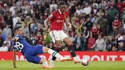 Kemenangan Manchester United dilesakkan Casemiro, Anthony Martial, Bruno Fernandes, Marcus Rashford. Chelsea berhasil memperkecil ketertinggalan melalui gol yang disarangkan Joao Felix. (AP Photo/Dave Thompson)