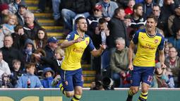 Aaron Ramsey melakukan selebrasi gol. Ia telah tampil 150 kali bagi Arsenal