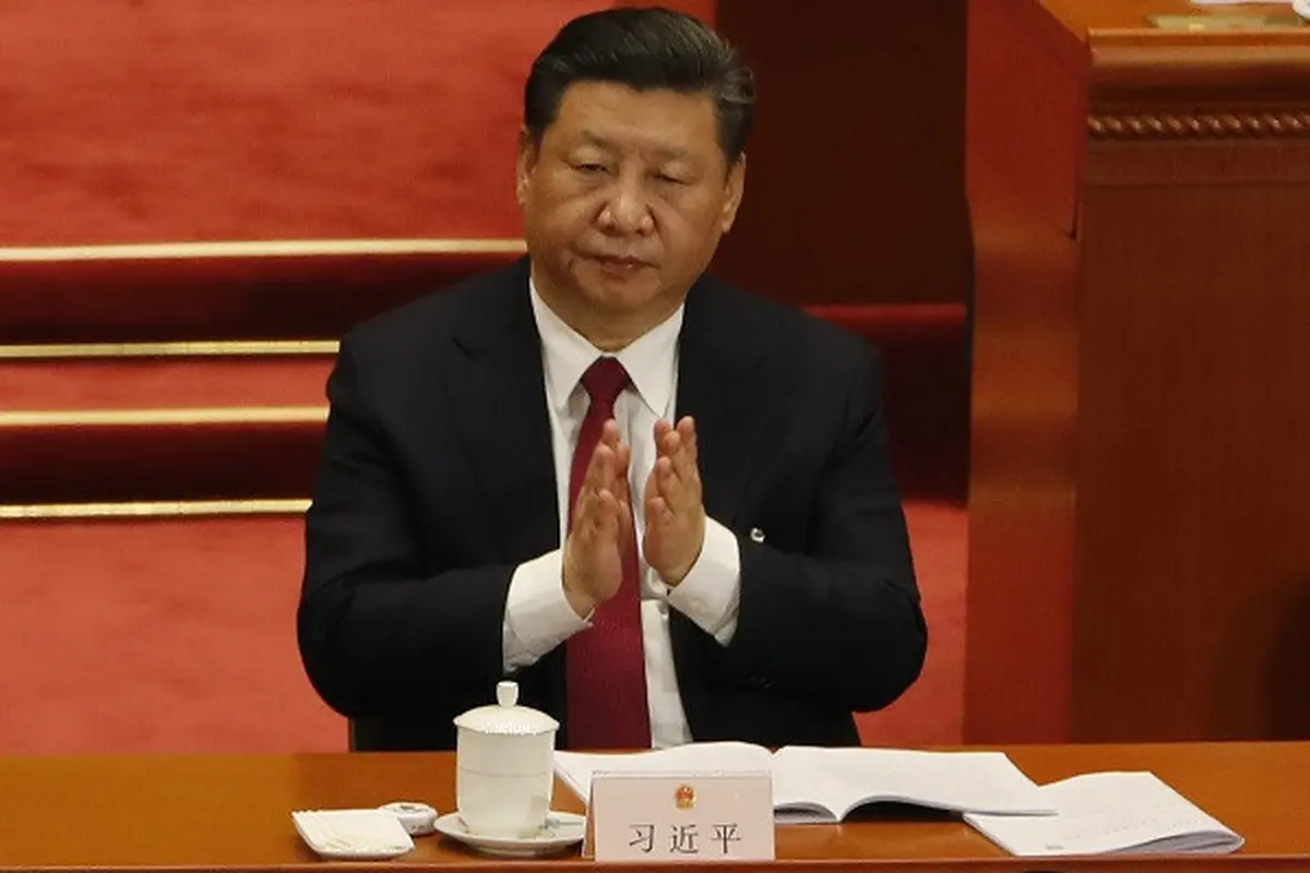 Presiden Xi Jinping saat menghadiri Kongres Rakyat Nasional yang memutuskan menyetujui penghapusan masa jabatan presiden