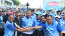 Menteri ESDM Ignasius Jonan (kedua kiri), bersama Direktur Utama PLN, Sofyan Basir (ketiga kiri) saat menghadiri Family Day 72 PLN di Kawasan Jakarta Convention Center (JCC) di Jakarta, Minggu (3/12). (Liputan6.com/Angga Yuniar)