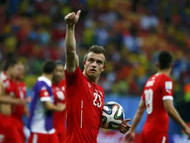 Gelandang Timnas Swiss, Xherdan Shaqiri, mencetak hattrick saat berlaga melawan Honduras di laga penutup penyisihan Piala Dunia 2014 Grup E di Stadion Amazonia, Manaus, Brasil, (26/6/2014). (REUTERS/Michael Dalder)