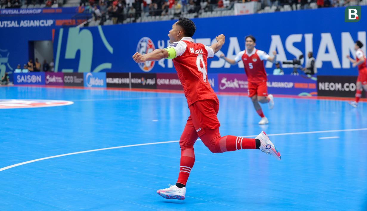 Pemain Timnas Futsal Indonesia, Mochammad Iqbal melakukan selebrasi setelah mencetak gol pembuka ke gawang Korea Selatan dalam laga Grup A Piala Asia Futsal 2026 di Indonesia Arena, Senayan, Jakarta, Selasa (27/01/2026). (Bola.com/Bagaskara Lazuardi)