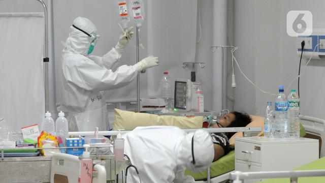 FOTO: Perjuangan Paramedis Merawat Pasien COVID-19 di RSUD Kota Bogor