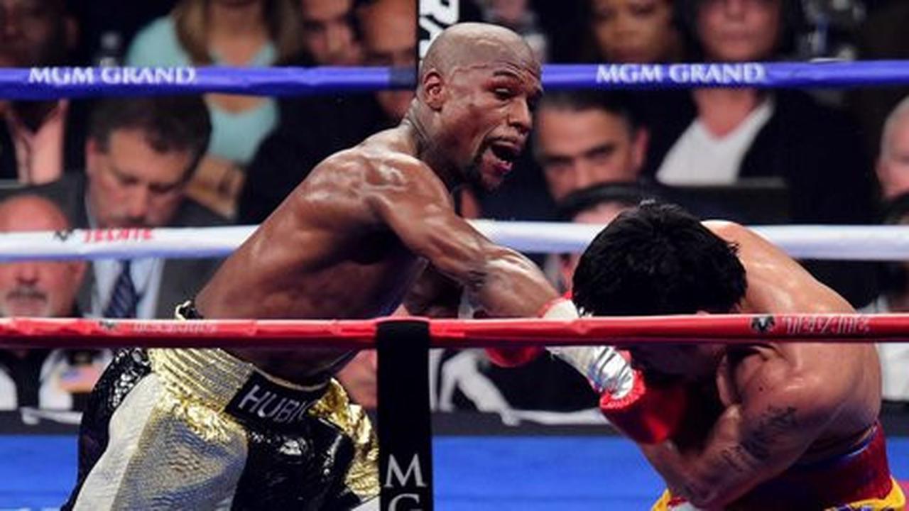 Mayweather menari-nari di dua ronde terakhir