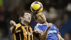 Chelsea's Frank Lampard is challenged by Hull City's Ian Ashbee during their Premier League football match at Stamford Bridge in London on February 7, 2009. AFP PHOTO/IAN KINGTON