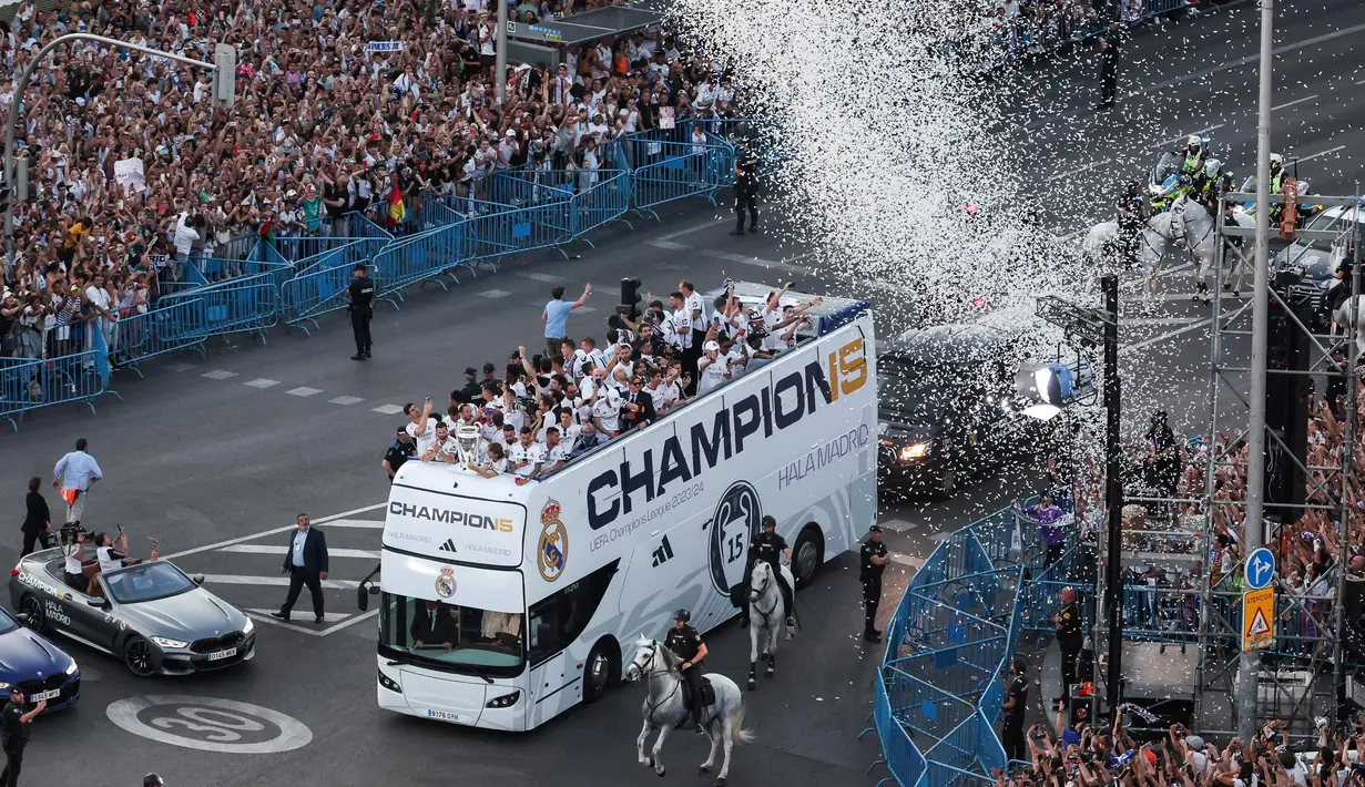 Real Madrid kembali merengkuh gelar juara Liga Champions usai mengalahkan Borussia Dortmund 2-0 di Wembley, London, Inggris, Sabtu (1/6/2024) atau Minggu (2/6/2024) dini hari WIB. (Pierre-Philippe MARCOU/AFP)