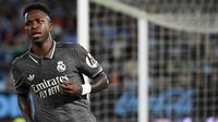 Pada menit ke-66, Vinicius Junior berhasil mencetak gol keunggulan Real Madrid. (MIGUEL RIOPA/AFP)