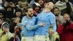 Manchester City sukses membungkam Bayern Munchen dengan skor telak 3-0 pada laga leg pertama babak perempatfinal Liga Champions 2022/2023 di Etihad Stadium, Rabu (12/4/2023) dini hari WIB. Tiga gol The Citizens masing-masing disumbangkan oleh Rodri pada menit ke-27, Bernardo Silva (70') dan Erling Haaland (76'). Dengan tambahan satu gol, Erling Halaand hingga kini telah mencetak total 45 gol di semua kompetisi musim ini dan mencatat rekor sebagai pemain tertajam Premier League di semua ajang dalam satu musim kompetisi. (AP Photo/Jon Super)