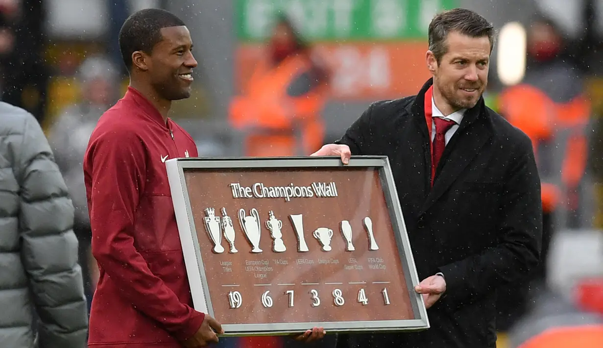 Georginio Wijnaldum. Setelah menjalani 5 musim yang menyenangkan bersama Liverpool, gelandang asal Belanda ini memilih tantangan baru bermain di PSG mulai musim 2021/2022. Dilepas secara gratis, Wijnaldum diprediksi akan dikontrak selama 3 musim di PSG. (Foto: AFP/Pool/Paul Ellis)