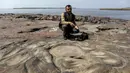 Ukiran-ukiran tersebut merupakan situs arkeologi yang "sangat penting", kata Jaime Oliveira dari Institut Warisan Sejarah Brasil (Iphan). (Michael Dantas / AFP)