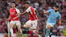 Manchester City melakukan tiga pergantian pemain di menit ke-68. Jeremy Doku, Matheus Luiz, John Stones coba dimasukkan untuk mengubah permainan. Namun justru Arsenal kembali yang dapatkan peluang lewat Odegaard, kendati tembakannya masih melambung dari gawang Ederson di menit ke-75. (AP Photo/Kirsty Wigglesworth)
