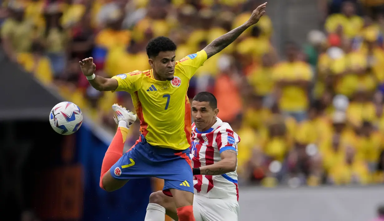 Berkat kemenangan ini Kolombia merebut tiga poin pertama di Grup D, sedangkan Paraguay gagal meraih poin. (AP Photo/David J. Phillip)