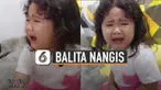 Sang ibu balita berusaha menenangkannya secara perlahan.
