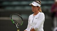 Petenis Spanyol, Garbine Muguruza, kalah pada babak kedua Wimbledon 2016 dari petenis Slowakia, Jana Cepelova, Kamis (30/6/2016). (Reuters/Paul Childs)