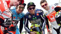 Andrea Iannone, Andrea Dovizioso, Valentino Rossi (EPA/Stringer)