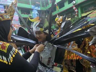 Sejumlah pelajar sekolah BPS&K Jakarta bersiap melakukan karnaval, Sabtu (31/8/2024). (merdeka.com/Imam Buhori)