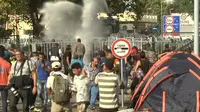 Halau Pengungsi dengan Gas Air Mata, Jerman Protes ke Hungaria (CNN)