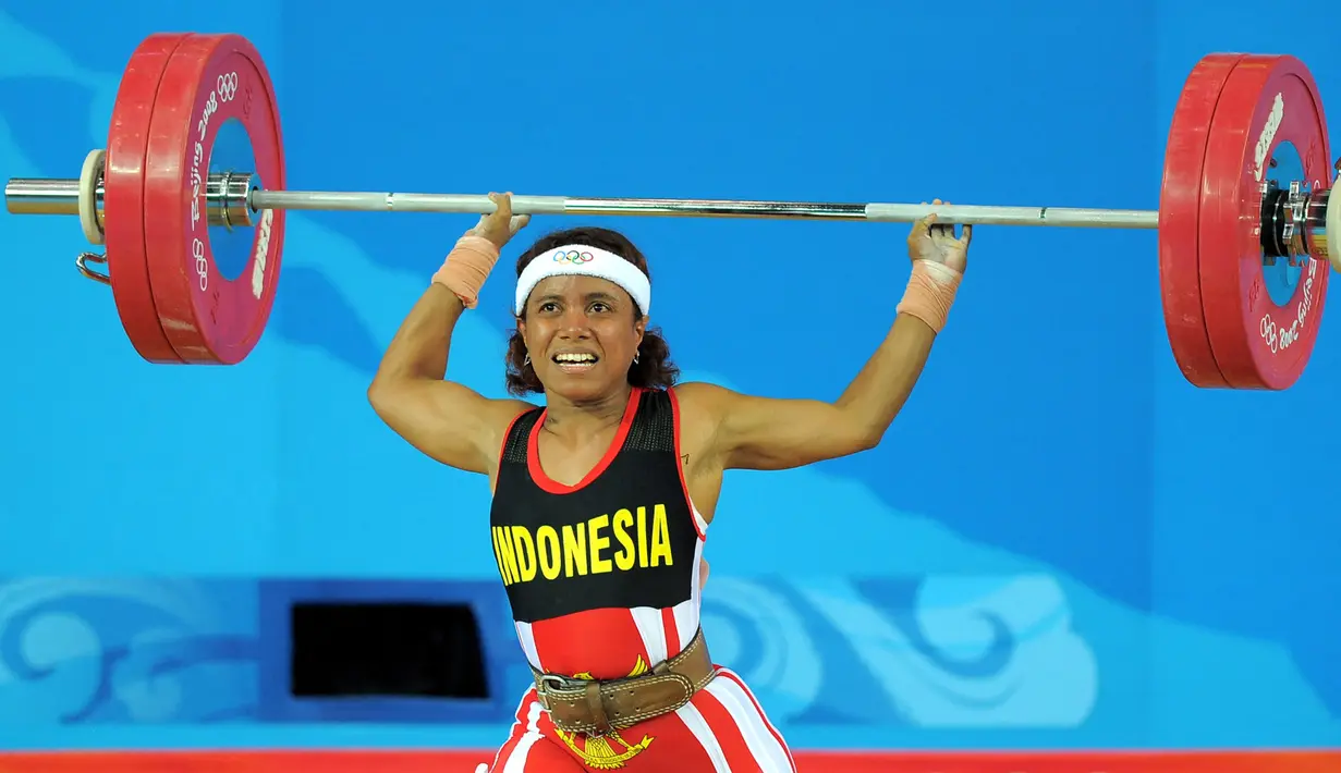 Dunia olahraga Indonesia tengah berduka setelah legenda angkat besi Lisa Rumbewas meninggal dunia. Lisa Rumbewas dikabarkan tutup usia di RSUD Jayapura, Papua, pada Minggu (14/1/2024) sekitar pukul 03.00 WIT. (AFP/Jung Yeon-Je)