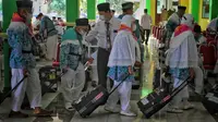 Jemaah calon haji kloter I asal Kabupaten Pati telah tiba di Asrama Haji Donohudan, Boyolali, Jumat (3/6).(Liputan6.com/Fajar Abrori)