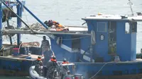 KRI Torani-860 Tangkap Kapal Ikan Asing Malaysia di Selat Malaka