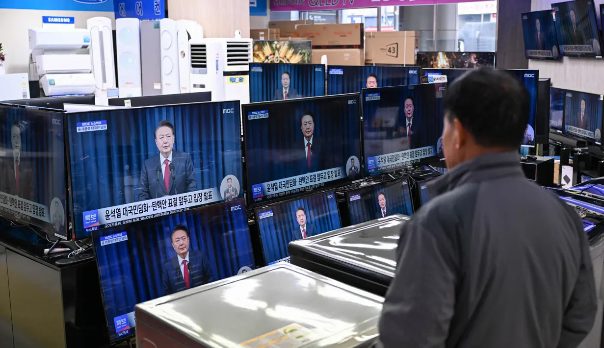 Presiden Korea Selatan Yoon Suk Yeol mengaku menyesal dan berjanji tidak akan mengumumkan kembali kebijakan darurat militer. (Jung Yeon-je/AFP)