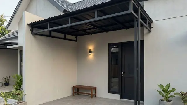 Kanopi Industrial dengan Rangka Hitam dan Atap Spandek