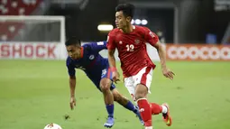 Arhan harus absen pada laga pamungkas melawan Thailand karena akumulasi kartu kuning. Talent muda PSIS Semarang itu mendapatkan kartu kuning pada dua leg semifinal melawan Singapura. (AP/Suhaimi Abdullah)