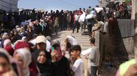 Terbaru, dalam pendistribusian bantuan pada Selasa (24/6/2025) di Gaza, 44 warga tewas. (BASHAR TALEB/AFP)