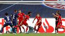 Pemain Bayern Munchen, Kingsley Coman, melakukan selebrasi usai mencetak gol ke gawang Paris Saint-Germain (PSG) pada laga final Liga Champions di Stadion The Luz, Portugal, Senin (24/8/2020). Bayern Munchen menang 1-0 atas PSG. (Matthew Childs/Pool via AP)