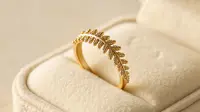 Cincin Emas Motif Ukiran Suku (Meta AI)