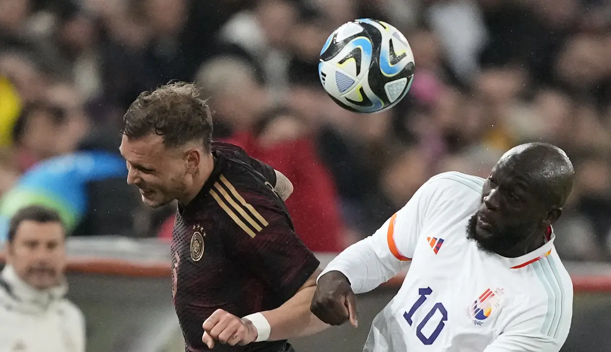 <p>Meski bermain sebagai tim tamu, Belgia secara mengejutkan tampil lebih menekan di awal babak pertama. (AP Photo/Martin Meissner)</p>