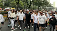 Bakal calon presiden (bacapres) Ganjar Pranowo menggelar kegiatan Jalan Santai di Car Free Day (CFD) Jalan Sudirman-Thamrin, Jakarta. (Liputan6.com/Nanda Perdana Putra)