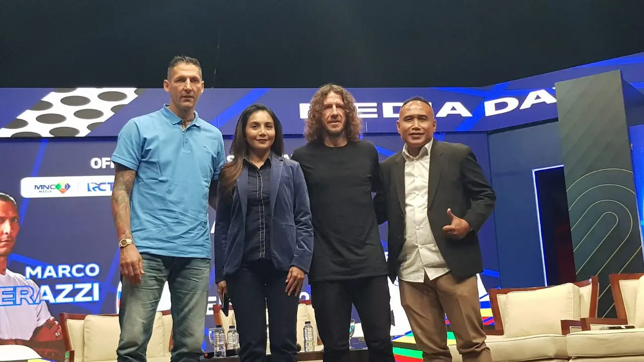 Marco Materazzi dan Carles Puyol