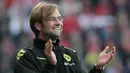 Juergen Klopp merupakan salah satu pelatih legendaris di Dortmund. Berkat sejumlah prestasi yang pernah dirinya raih selama tujuh musim menukangi Die Borussen. (AFP/Daniel Roland)