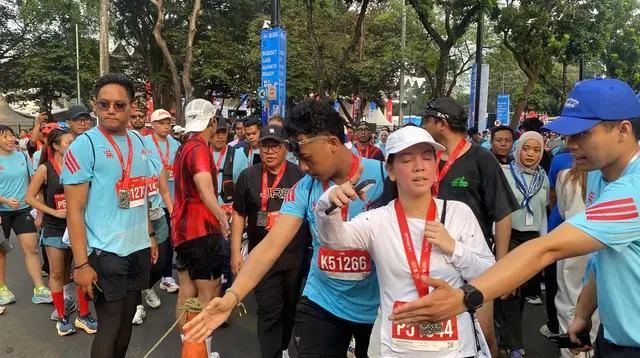Ragam Kisah Jakarta Running Festival 2026: Dari Tongkat Bantu hingga Selempang Wisuda