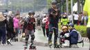 Berbagai aktivitas dilakukan sepanjang Jalan Jenderal Sudirman sampai Jalan M. H. Thamrin dekat Monumen Nasional. (Bola.com/M Iqbal Ichsan)