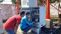 Ilustrasi proses pemulihan jaringan Telkomsel di wilayah terdampak banjir di Kecamatan Masamba, Sulawesi Utara. (Dok. Telkomsel)