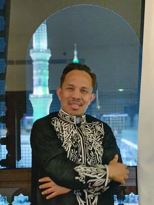 Halilintar Asmid.