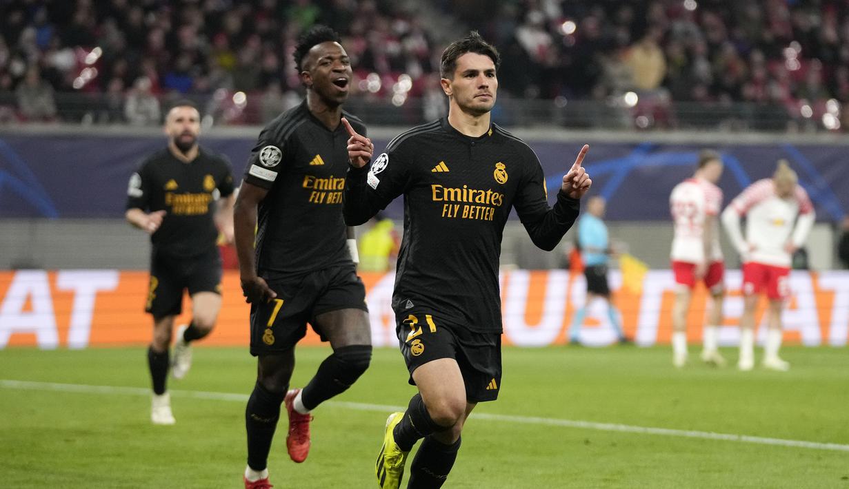 Pemain Real Madrid, Brahim Diaz melakukan selebrasi setelah mencetak gol ke gawang RB Leipzig pada laga leg pertama 16 besar Liga Champions 2023/2024 di Red Bull arena stadium, Leipzig, Jerman, Rabu (14/02/2024) dini hari WIB. (AP Photo/Matthias Schrader)