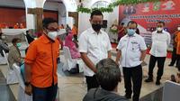 Mensos Juliari turun langsung menyalurkannya di Kantor Pos Medan, Jalan Pos, Kesawan, Medan Barat