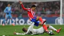 Berstatus tuan rumah, Atletico Madrid bermain agresif. (Oscar DEL POZO CA—AS/AFP)