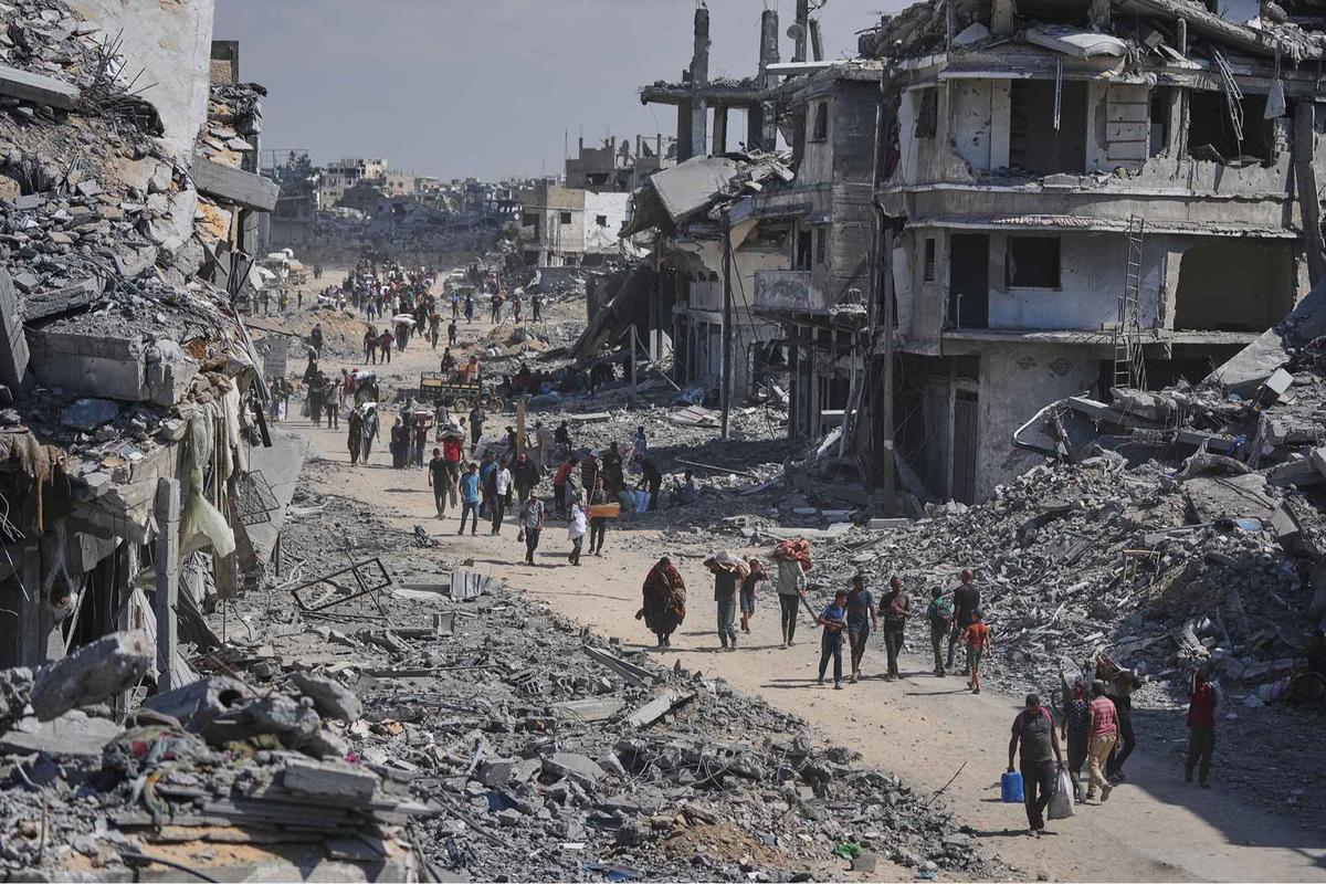 FOTO: Ratusan Ribu Warga Palestina Kembali ke Gaza Usai Gencatan Senjata dengan Israel
