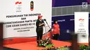 Menko PMK, Puan Maharani memberi sambutan saat upacara pengukuhan di Istora Senayan, Jakarta, Minggu (5/8). Di Asian Games 2018, Indonesia memiliki kekuatan 938 atlet, 365 ofisial, dan 80 headquarter. (Liputan6.com/Helmi Fithriansyah)