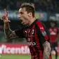 Gelandang AC Milan Lucas Biglia merayakan golnya ke gawang Chievo dalam lanjutan Liga Serie A di Stadio Marc'Antonio Bentegodi, Minggu (10/3/2019) dini hari WIB. (Filippo Venezia/ANSA via AP)