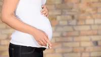 Ilustrasi merokok saat hamil (iStockphoto)