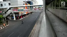Kondisi lalu lintas yang lengang di kawasan pusat pertokoan Glodok, Jakarta Jumat (1/9). Sesuai ketetepan pemerintah Hari Raya Idul Adha 1438 H pada hari ini merupakan hari libur Nasional dan sejumlah Toko di Glodok tutup. (Liputan6.com/Helmi Afandi)